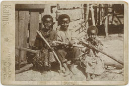 Children Sitting Outside, circa 1940