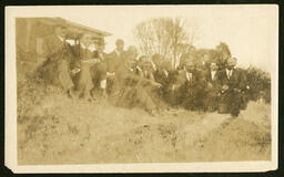 Men Sitting on a Lawn, circa 1915