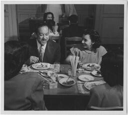 Langston Hughes Shares a Meal, circa 1955