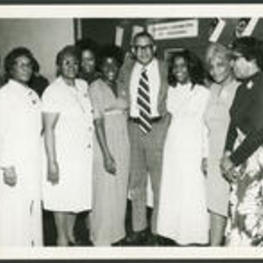 Group portrait of Dr. Vivian Wilson Henderson and six unidentified women during the 1974 "Henderson, We Love you Madly Day" Celebration.