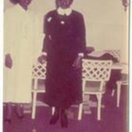 Anna E. Hall standing with unidentified woman.