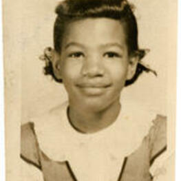 A school photo of a young Ruby D. Smith.