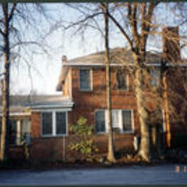 Outside view of a side of the Brazeal family brick home.