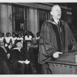 James R. McCain, president of Agnes Scott College, speaks at the dedication ceremony for the Trevor Arnett Library. Written on verso: President James R. McCains at Trevor Arnett library dedication, April, 1949