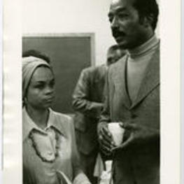 Sonia Sanchez and Hoyt Fuller at a gathering.