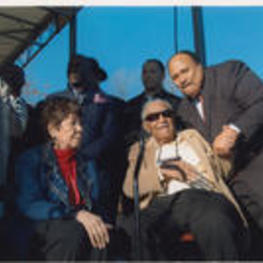 Martin Luther King, III shakes Joseph E. Lowery's hand at the Selma Bridge Crossing Jubilee event while Evelyn G. Lowery looks on.