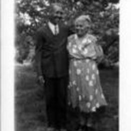 Lemoine DeLeaver Pierce's maternal grandparents Luther and Alice White, standing outside together.
