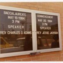 Exterior view of Baccalaureate and Commencement announcements. Written on recto Baccalaureate May 19 1984, 3pm Speaker Rev. Charles G. Adams. Commencement May 20 1984 3pm Speaker Rev. Jesse Jackson.