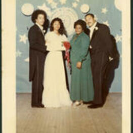 Portrait of Dwight Cedric Henderson, son of Dr. Vivian Wilson Henderson, with his prom date, Yvonne Strickland, and her parents.
