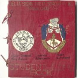 A book containing information on members of Delta Sigma Theta sorority and their service projects.