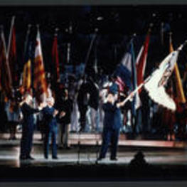 Mayor Jackson waves a flag at an event at the Sarajevo Olympic Relief Ceremony.
