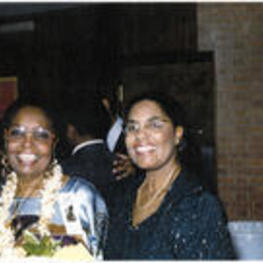Portrait of Marian E. Barnes and Joanie Stewart. Written on verso: Marian E. Barnes and daughter Joanie Stewart at induction ceremony for African American Women's Hall of Fame. Austin 3-7-98.