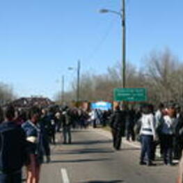 A crowd of demonstrators march across the Edmund Pettus Bridge in Selma, Alabama as part of the annual Bridge Crossing Jubilee celebration.