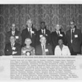 Benjamin E. Mays and other recipients of the College Board Medal for Distinguished Service to Education. Written on recto: Recipients of the College Board Medal for Distinguished Service to Education: (seated from left to right) John W. Gardner, Chairman, Common Cause, Washington, D.C.; Mary I. Bunting, President Emerita, Radcliffe College; James S. Coleman, Professor pf Sociology, University of Chicago; Elizabeth D. Koontz, Assistant State Superintendent for Teacher Education, North Carolina State Department of Public Instruction; (standing from left to right) Clark Kerr, Chairman and Staff Director, Carnegie Council on Policy Studies in Higher Education; Henry Chauncey, former President, Educational Testing Service; Benjamin E. Mays, President Emeritus, Morehouse College, Atlanta, Georgia; John M. Stalnaker, President Emeritus and Honorary Director, National Merit Scholarship Corporation; John U. Monro, Dean of General Education, Miles College, Birmingham, Alabama. The Medals were presented on October 26 at the Waldorf-Astoria in New York, during the Board's 1976 National Frum, the concluding event of its 75th Anniversary Year.