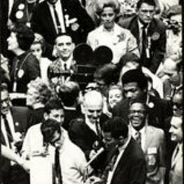 A crowd at an identified event with Julian Bond.