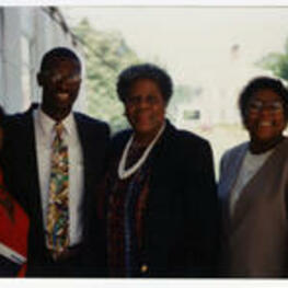 A group attends an I.T.C. grand reunion. Written on verso: Gloria Tate, Mr. Simmons, Minnie, Angelin Simmons. ITC Grand Reunion 1994.
