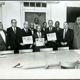 Brailsford R. Brazeal stands with John W. Davis, Charles H. Haynes, and Walter W. Scott in a group presentation from the Morehouse College Alumni Association.