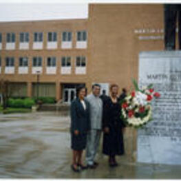 People celebrate at an Atlanta Student Movement 40th Anniversary event. Featured figure: Mary Ann Smith in front of Martin Luther King International Chapel and Hugh M. Gloster Hall.
