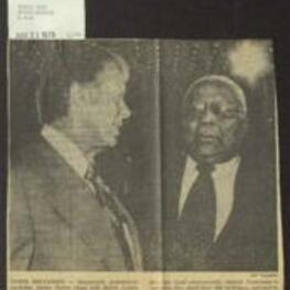 Newspaper photo of Democratic presidential candidate Jimmy Carter with Martin Luther King Sr. prior to addressing members of the Voter Education Project in regards to an automatic voter registration bill. 1 page.