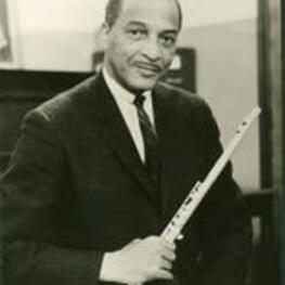 Portrait of Wayman Carver holding his flute.
