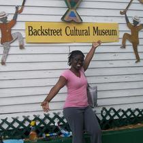A Spelman SIS Student Outside the Backstreet Cultural Museum, circa 2009