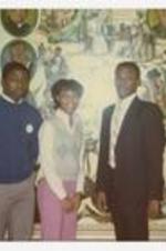 Indoor group portrait of young men and woman. Written on verso: "Soph. Class Officers 1984; L to R Roosevelt Hudson, Anquinette Daniels, Sim Reid, Nathaniel Weston".