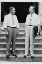 Arthur Raper (left) stands with an unidentified man on the steps of Gammon Chapel.