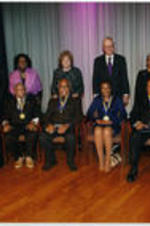 Joseph E. Lowery (third from left, seated) is shown at a ceremony with other award recipients, including Andrew Young. Shirley Franklin stands behind Young.