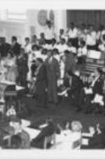 Joseph E. Lowery and Nelson Mandela (at center) are shown in Big Bethel A.M.E. Church amongst others during Mandela's visit to Atlanta, Georgia.