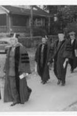 Dr. Harry V. Richardson walks with other inauguration participants. Written on verso: [Group of fundraisers for ITC], Inauguration of Dr. Harry V. Richardson, 1949.
