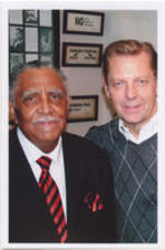 Joseph E. Lowery and priest Michael Pfleger pose for a photo during an event at St. Sabina Church in Chicago, Illinois.