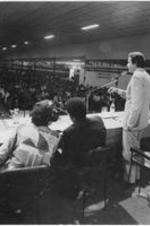 Joseph E. Lowery is shown sitting alongside panelists at the Meeting Per L'amicizia Fra I Popoli, the Meeting of Friendship Among the People, in Rimini, Italy. For more details about this event, see page 43 of the September-October 1980 SCLC Magazine: http://hdl.handle.net/20.500.12322/auc.199:07014.