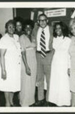 Group portrait of Dr. Vivian Wilson Henderson and six unidentified women during the 1974 "Henderson, We Love you Madly Day" Celebration.