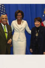 Joseph and Evelyn Lowery pose for a photo with First Lady Michelle Obama.