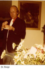 View of Dr. Bunge at a graduation party. Written on recto: Dr. Bunge
