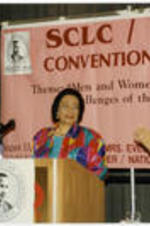 Coretta Scott King stands at the podium during the SCLC/W.O.M.E.N. Luncheon held as part of the proceedings of the 39th Annual Southern Christian Leadership Conference Convention in Detroit, Michigan.