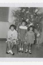 Written on verso: Clark College Christmas Family Party, Children of Dr. And Mrs. Alfred S. Spriggs: 1., 2., 3., ca. 1966.