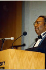 C. Eric Lincoln talks at a Duke University function.