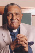 A portrait photo of Joseph E. Lowery sitting in a pastor chair.