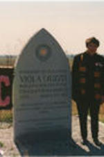 Evelyn G. Lowery and Johnnie Carr are shown standing beside the Viola Liuzzo memorial monument.