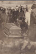 Lowering of casket of S. H. Archer.