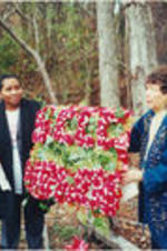 Evelyn G. Lowery and Ruby Shinhoster are shown with a SCLC/W.O.M.E.N. floral wreath during the Earl T. Shinhoster Memorial Highway marker commemoration while Tuskegee Mayor Johnny Ford looks on.