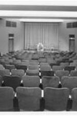 Interior of Dean Sage Hall auditorium looking towards the stage.