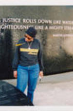 Evelyn G. Lowery and another woman examine the granite fountain designed by Maya Lin at the Civil Rights Memorial Center in Montgomery, Alabama.