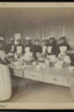 Female students in cooking class held in North Hall. Pictured are: Emma Escridge, Mrs. Clara Thomas, Mrs. Florida Beale Phillips, Mrs. Carrie Fambro Shepperson, Mrs. Maggie Wimbish, Mrs. Ella P. Baker, Mrs. C.C. (?)-teacher, Mrs. Mamie Henderson, Mrs. Katie (?), Mrs. Sara Brown, Mrs. Willie Bryant, and Mrs. Ursula Jackson Wade in cooking class.