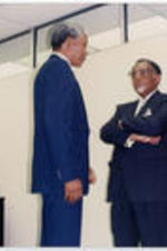 Joseph E. Lowery is in conversation with Nelson Mandela as Evelyn G. Lowery looks on during Mandela's visit to Atlanta, Georgia.