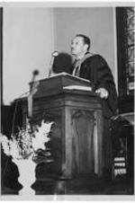 Dr. Harry V. Richardson speaks from the pulpit at Gammon Chapel.
