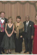 A group photo of Joseph and Evelyn Lowery (third and fourth from right) with others at a Big Brothers Big Sisters of Metro Atlanta banquet event.