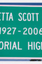 A photo of a road sign that reads "Coretta Scott King 1927-2006 Memorial Highway".