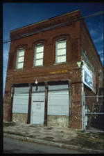 A building located in Reynoldstown. Text from slide presentation: In the 1950s, with the decline of the railroads, Reynoldstown began to decline.